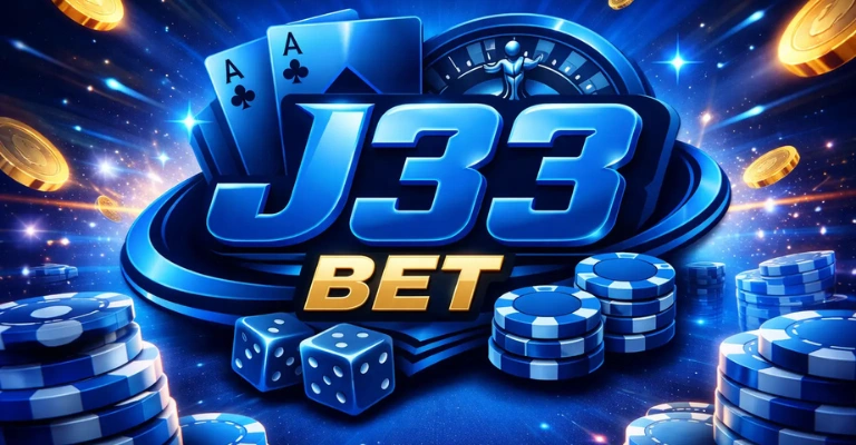 J33Bet Game Download Best (New Earning APK) 2025 2 J33Bet online casino banner with playing cards, dice, poker chips, and glowing blue gaming effects.